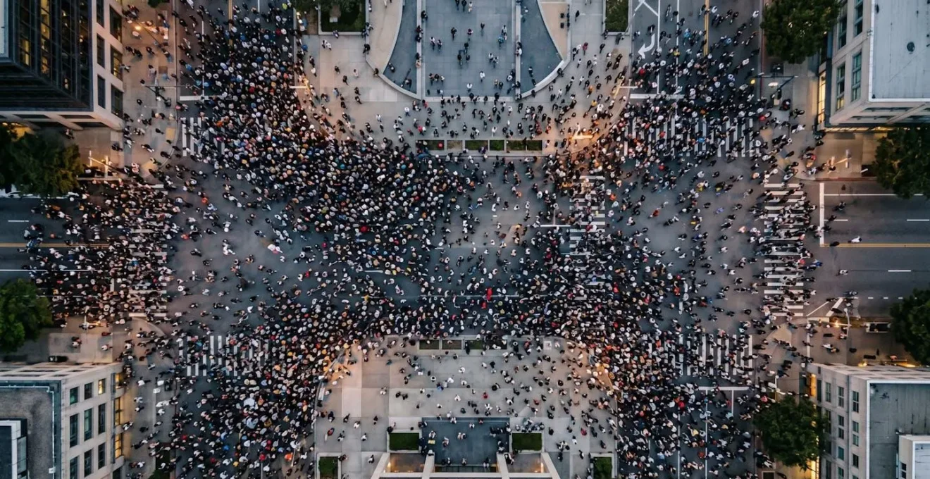 Aerial view of crowd movement patterns showing pressure waves