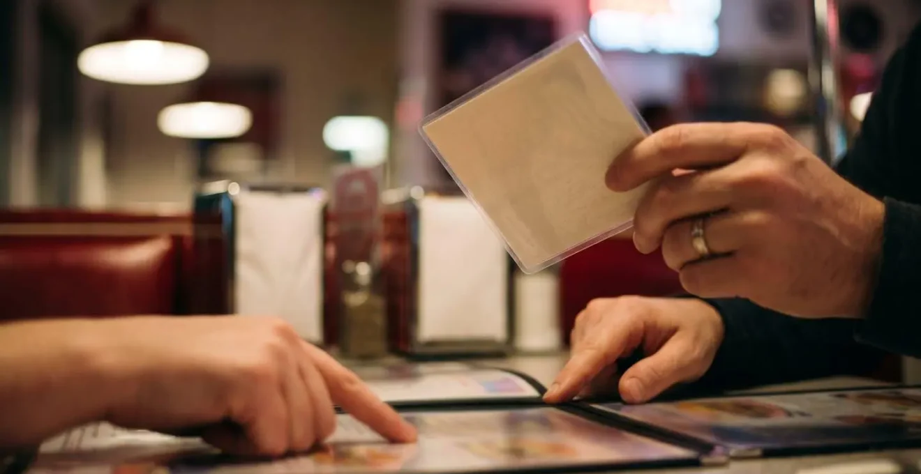 Friendly interaction between customer and diner staff discussing menu accommodations